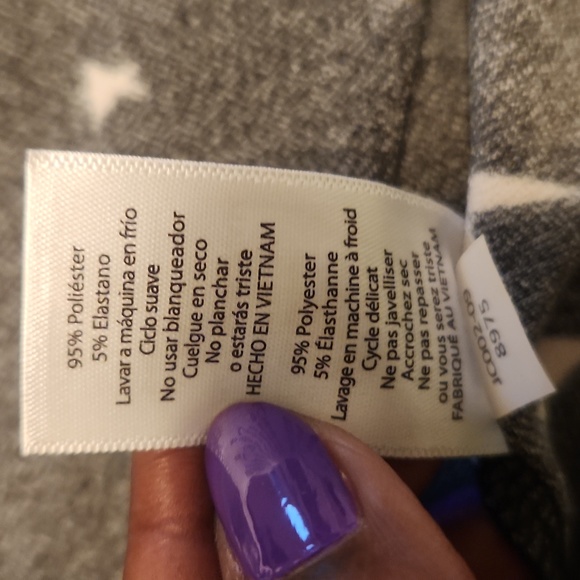 LulaRoe black and white skirt filled with stars. Size small but can fit … - Picture 5 of 5